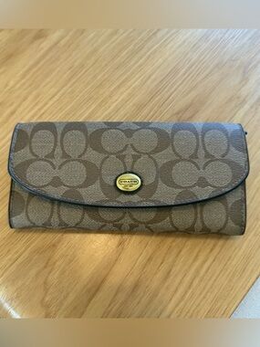 Coach Signature Canvas Continental Wallet in Brown